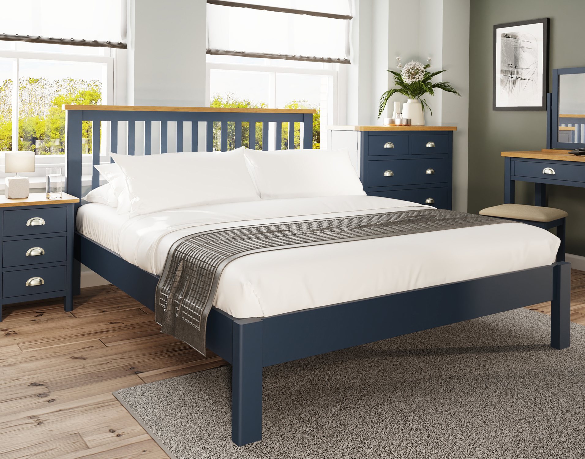 blue bedroom with oak furniture
