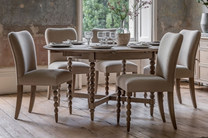 Gallery Direct Artisan Limewash Oak Extending Round Dining Table with Bobbin Detail Gallery Direct Artisan Limewash Oak Extending Round Dining Table with Bobbin Detail